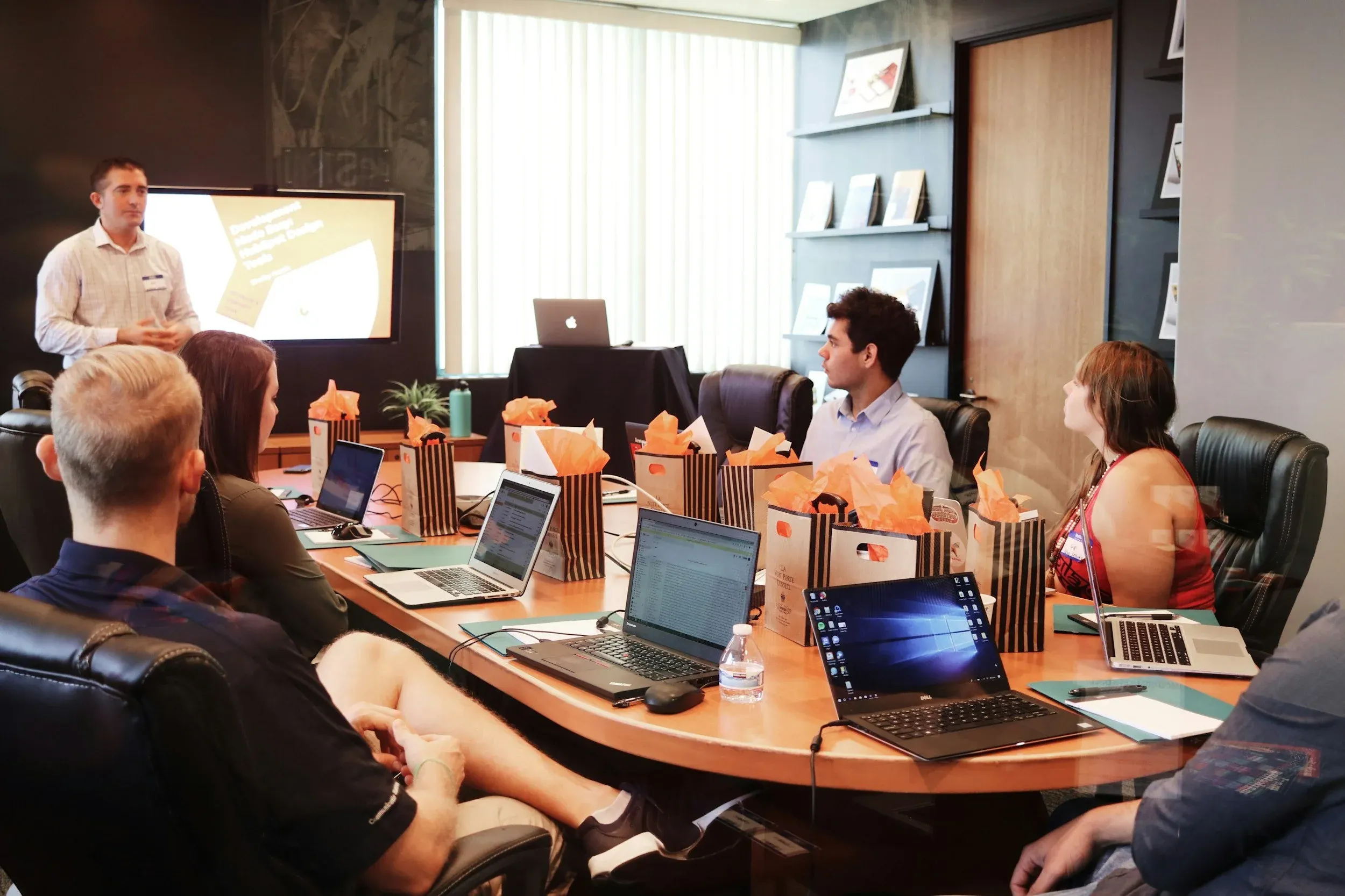 Startup team reviewing Series A cap table strategy in a board room
