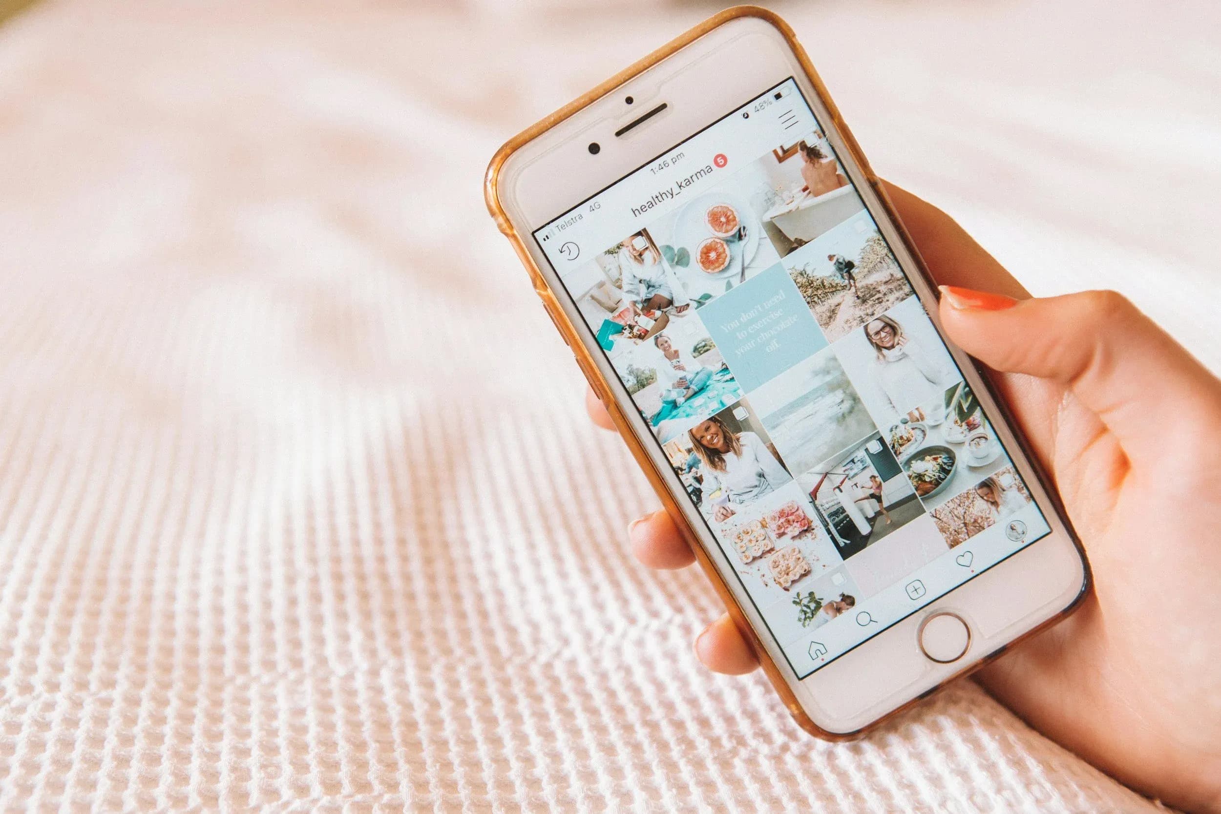 Person scrolling an Instagram lifestyle creator feed on a smartphone